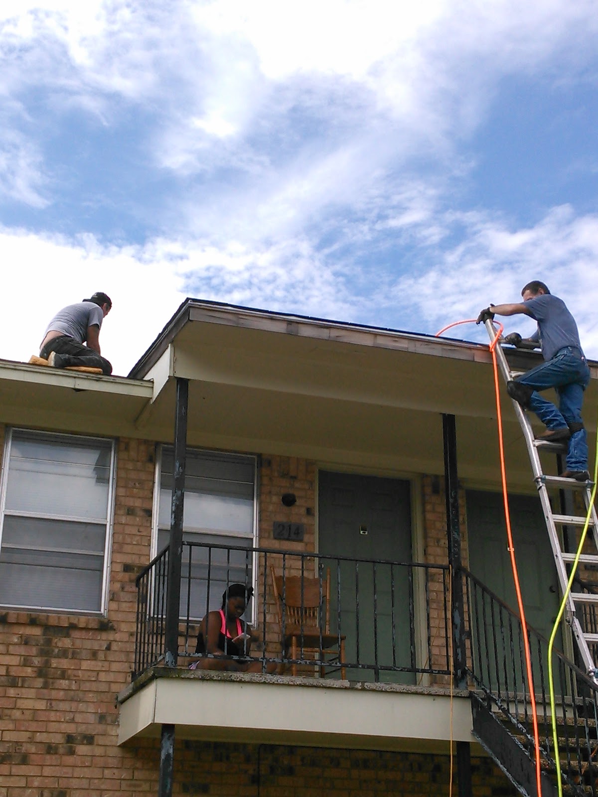 Roofers at work